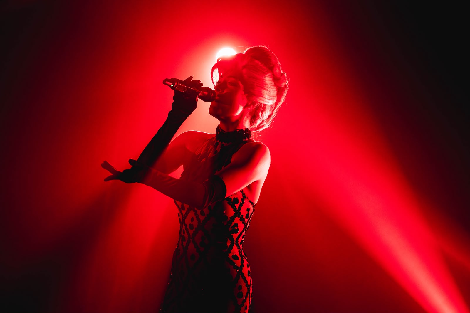 Moulin Rouge inspired act in red light